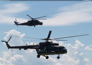 Dvojica Mi-24 a Mi-17